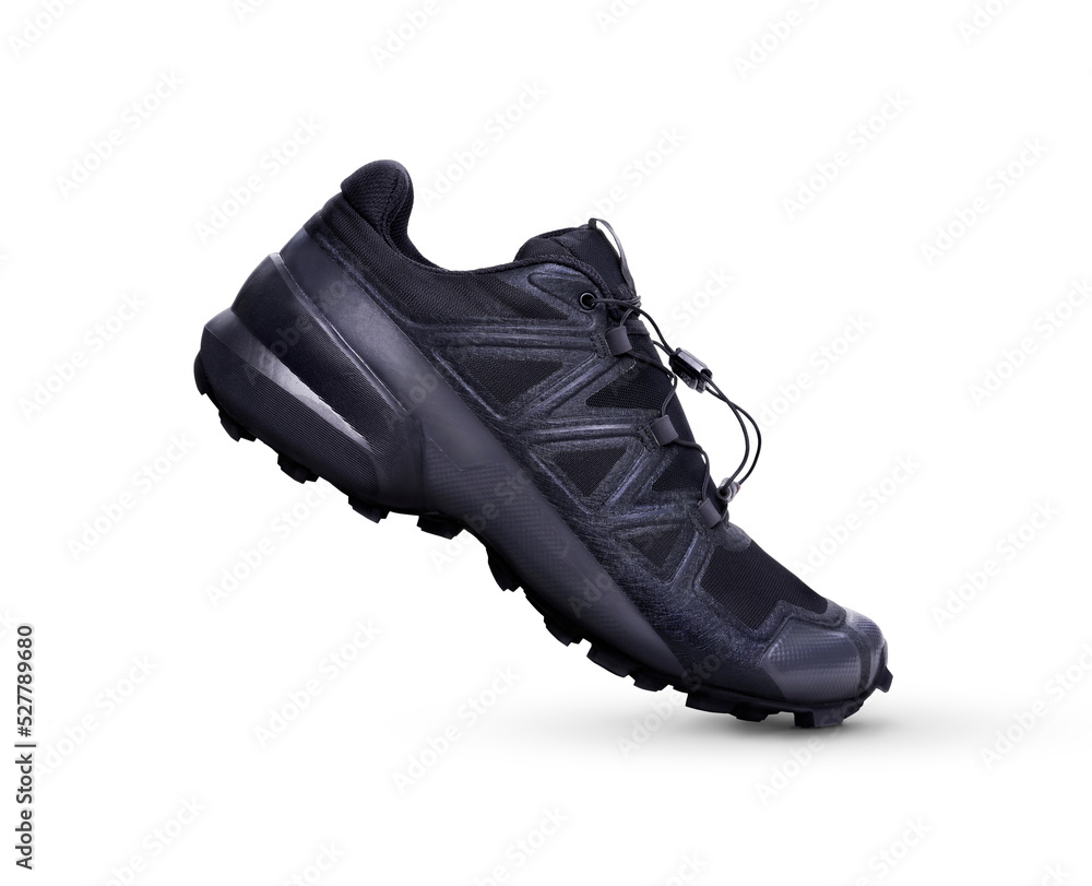 A side view of black trainers, sneakers Isolated on a flat background.