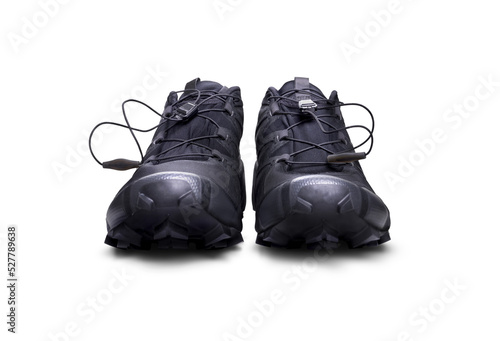 Obraz na płótnie A front view of black trainers, sneakers Isolated on a flat background. w salonie