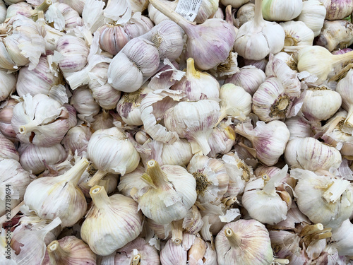 A close-up view of garlic in a store.