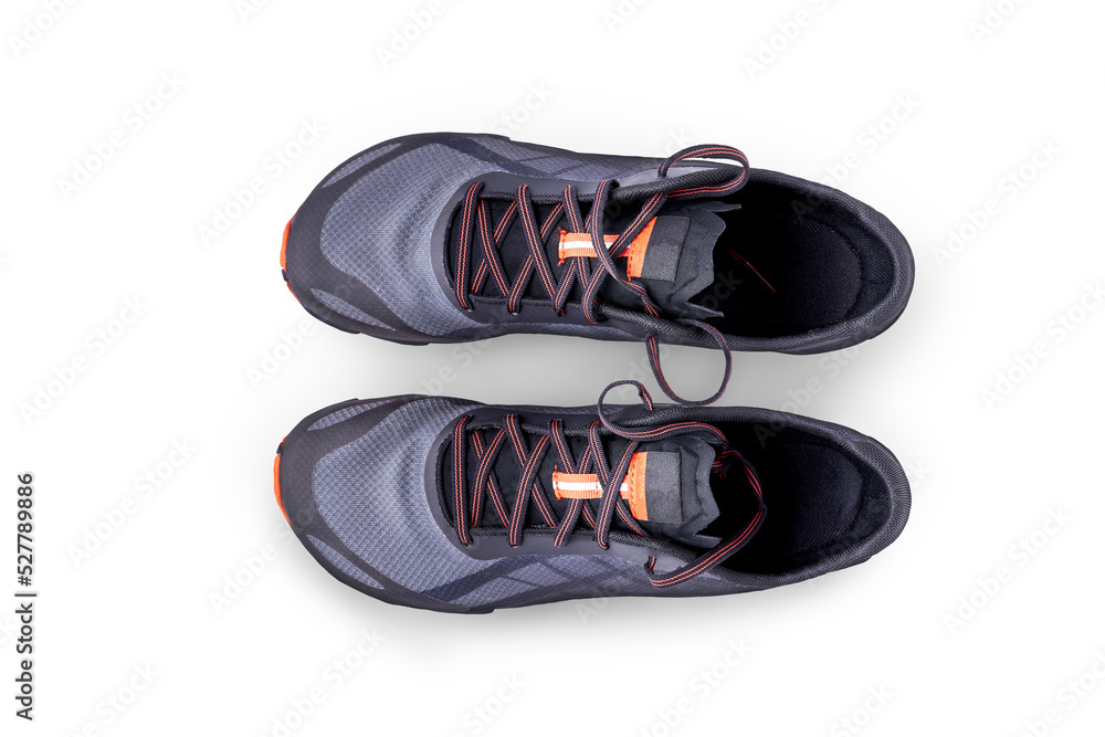 A top view of grey and orange trainers, sneakers Isolated on a flat background.