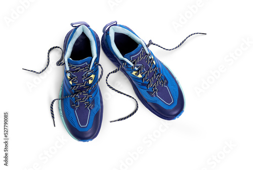 Obraz na płótnie A top view of blue trainers, sneakers Isolated on a flat background. w salonie