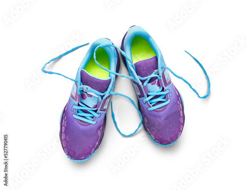Obraz na płótnie A top view of blue and purple trainers, sneakers Isolated on a flat background. w salonie