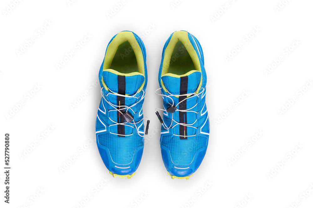 A top view of blue and yellow trainers, sneakers Isolated on a flat background.