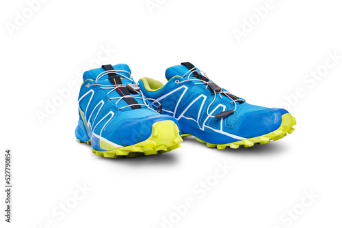 A front view of blue and yellow trainers, sneakers Isolated on a flat background.