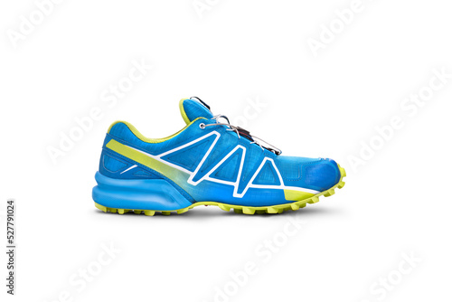 Obraz na płótnie A side view of blue and yellow trainers, sneakers Isolated on a flat background. w salonie