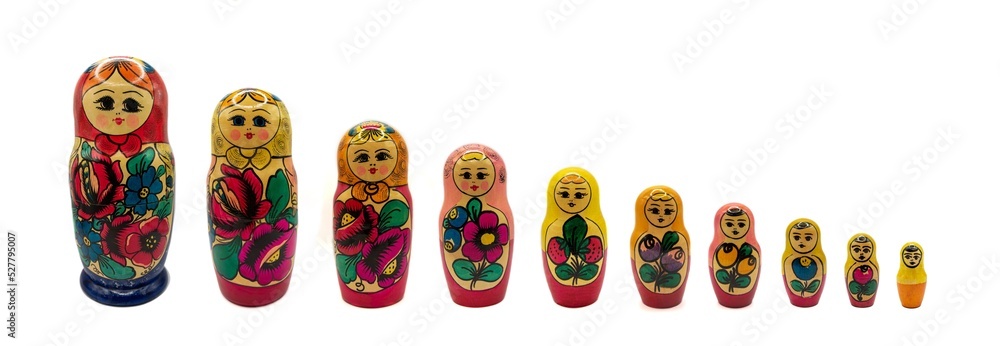 Ten 10 Traditional Russian dolls on white isolated background.
