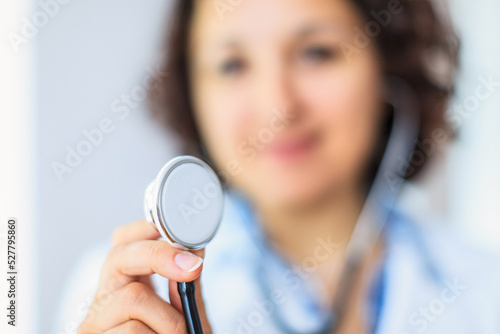Nurse holding stethoscope