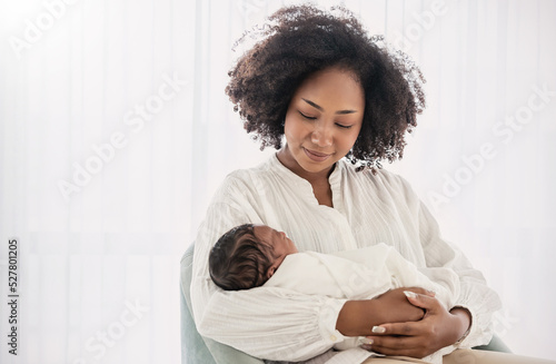 Close up portrait of beautiful young African American  mother holding sleep newborn baby in hospital. Healthcare medical love black afro woman lifestyle mother's day, breast concept with copy space.