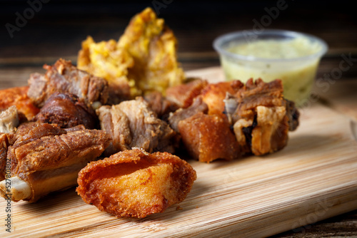 Traditional Colombian food with fried meat and banana