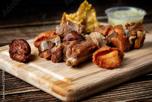 Traditional Colombian food with fried meat and banana