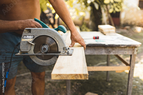 The process of making furniture from wood. Production of furniture. Joiner. Woodworking. Grinding and preparation of boards. Carpenter.