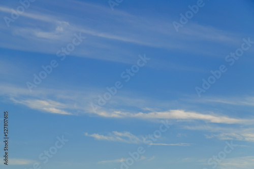 Blue sky cirrus clouds.