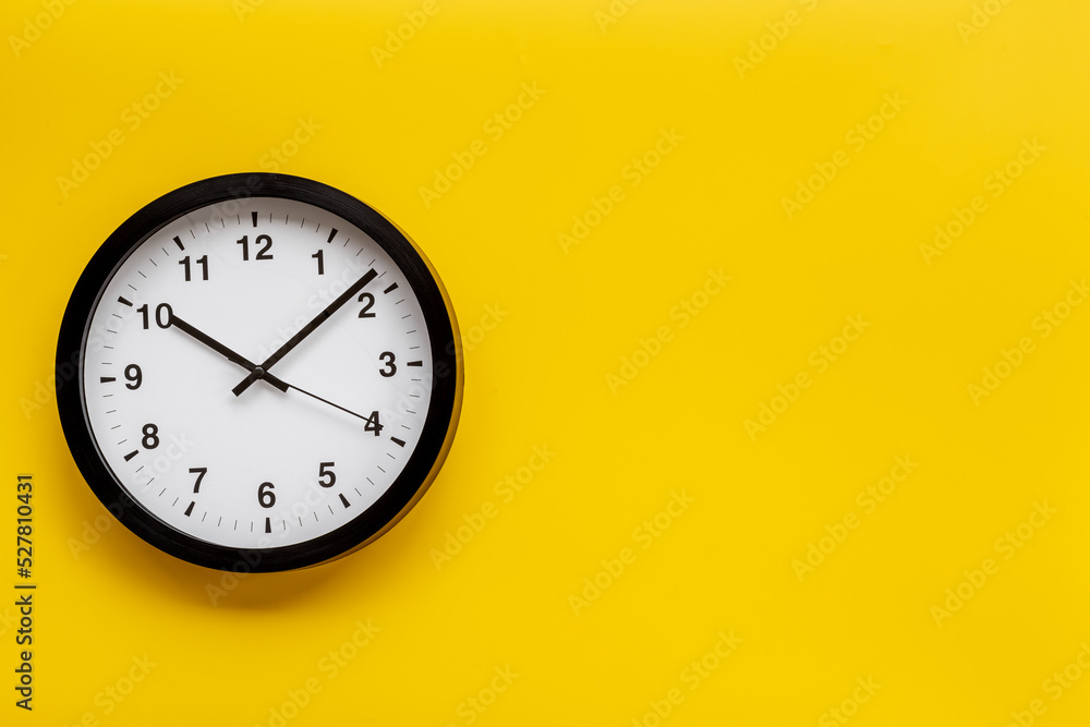 Round wall black and white clock. Time to work or rest concept Round wall black and white clock. Time to work or rest concept