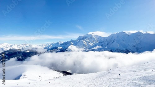 Panorama above clouds of Alps mountains and Mont Blanc massif