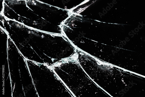 Broken glass on black background