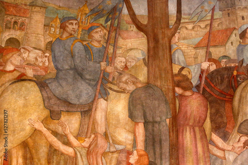 Sainte Genevieve's cathedral, Nanterre.  Fresco painted by Paul Lemasson (1927). The people of Paris watch Sainte Genevieve's reliquary carried in procession and the sick are cured. photo