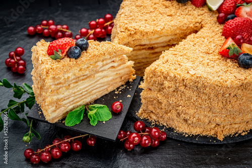 Photography Napoleon cake decorated with berries and fruits