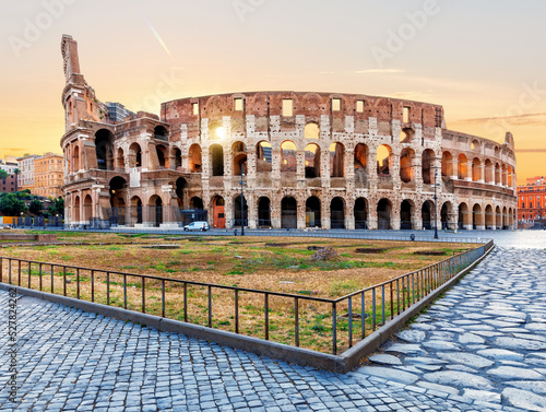 Roman Coliseum at sunrise, the full view without people, Italy