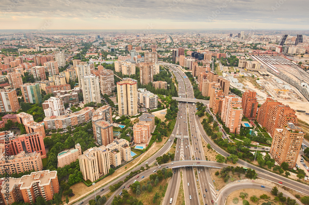 Aerial view of the city of Madrid and one of its highways