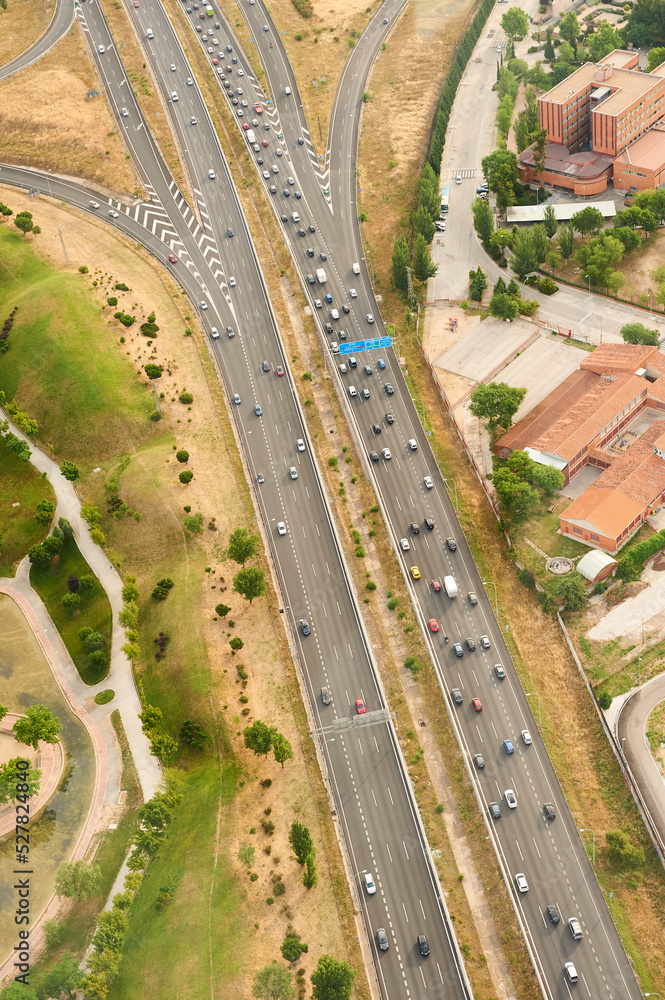 Obraz premium Aerial view of a highway with traffic