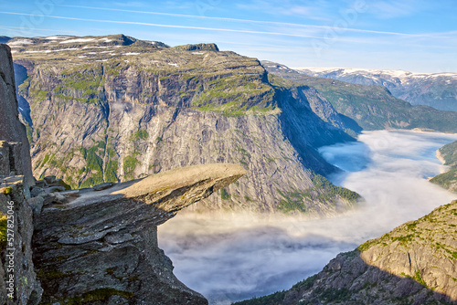 Trolltunga or Troll's Tongue early morning in Norway photo