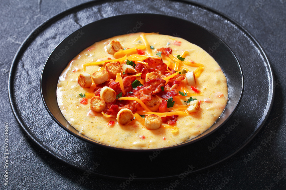 savory creamy pumpkin soup in bowl, top view savory creamy pumpkin soup in bowl, top view