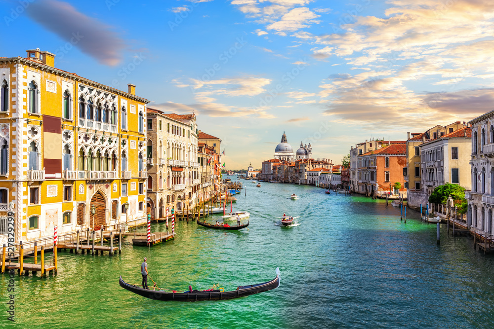 Gondoliers in the Grand Canal of Venice near Santa Maria della Salute, Italy