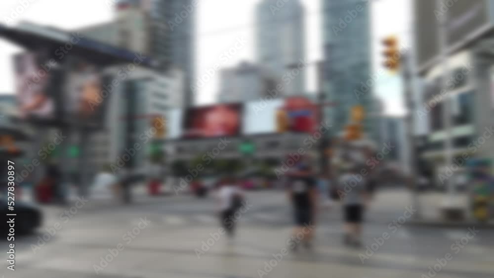 Pedestrian crossing on the Yonge-Dundas Square (Dundas Square). It's public square at the southeast corner of the intersection of Yonge Street and Dundas Street East in Downtown Toronto. Pedestrian crossing on the Yonge-Dundas Square (Dundas Square). It's public square at the southeast corner of the intersection of Yonge Street and Dundas Street East in Downtown Toronto.