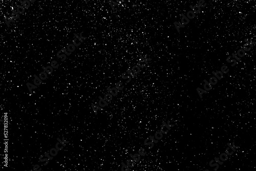 Chaotic white star bokeh on a isolated black background. falling blurry bokeh snow overlay  starry sky. white spots on black background  white drops and spots. abstraction