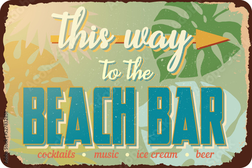 vintage grunge retro sign this way to the beach bar