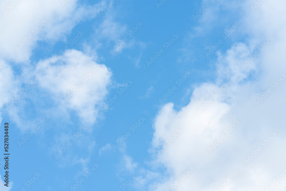 Beautiful cirrus clouds on blue sky on a sunny day background texture