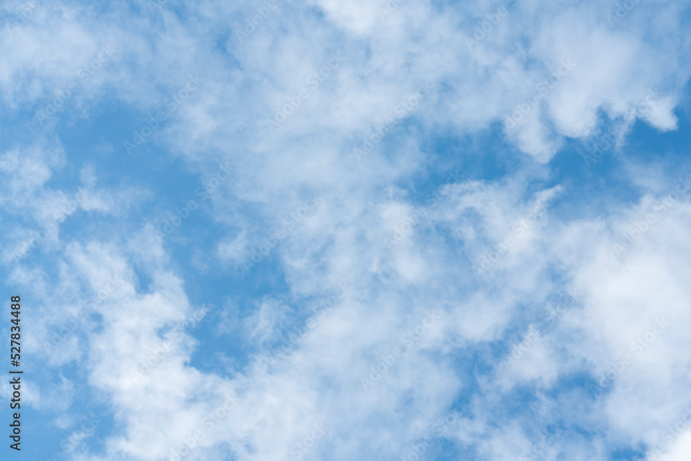 Beautiful cirrus clouds on blue sky on a sunny day background texture