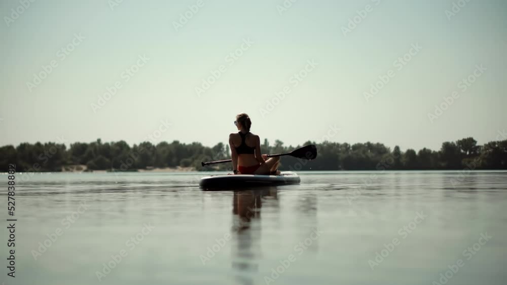 Stand Up Paddle Boarding Fitness. Warm Summer Beach Vacation Holiday. Travel Paddles Paddleboard. Sup Board Journey. Woman Relaxing On Sup Surf Swimming. Watersport Floating Surfboard Sport Recreation Stand Up Paddle Boarding Fitness. Warm Summer Beach Vacation Holiday. Travel Paddles Paddleboard. Sup Board Journey. Woman Relaxing On Sup Surf Swimming. Watersport Floating Surfboard Sport Recreation