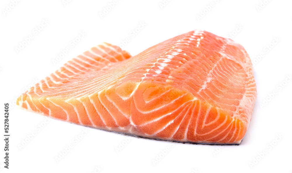 Salmon fillet on white background closeup. Fish isolated. Salmon fillet on white background closeup. Fish isolated.