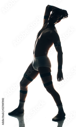 Silhouette man with beautiful muscular torso in underwear