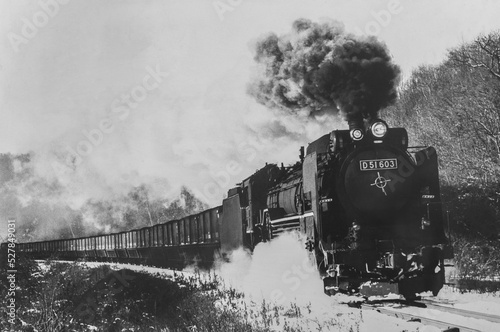 Old black and white photo of Japanese steam locomotive D51