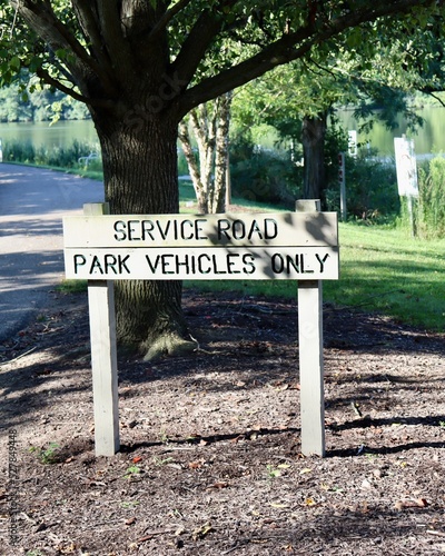 A close view of the wood service information sign.