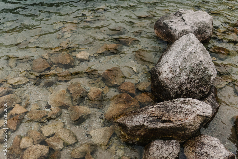 Mountain stones in water.