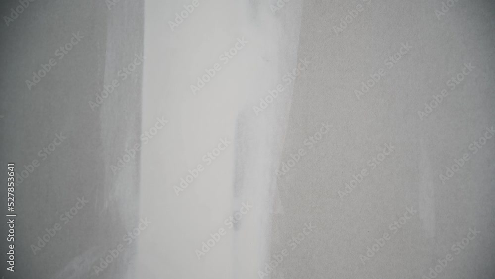 Man using Long Reach Drywall Sander, do it yourself concept Man using Long Reach Drywall Sander, do it yourself concept