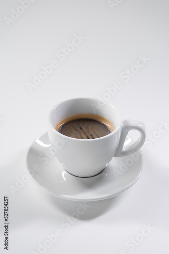 fresh hot espresso coffee cup with plate isolated on white background