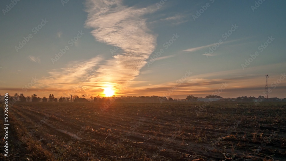Sunrise on a harvested field