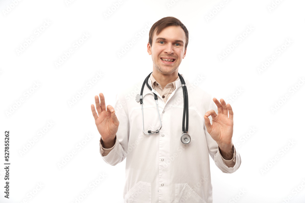 Portrait of happy doctor in white medical coat showing gesture all is well isolated on white background with copy space Portrait of happy doctor in white medical coat showing gesture all is well isolated on white background with copy space