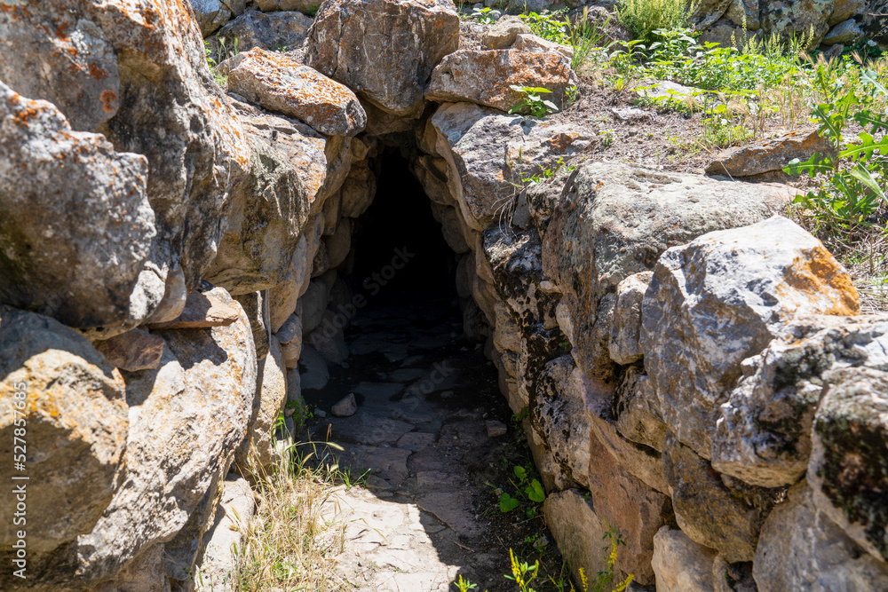 Closeup view of ancient Hittite tunnels built with stones in Alacahoyuk, Corum Turkey. Secret road and passage.