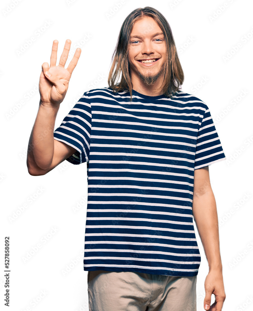 Handsome caucasian man with long hair wearing casual striped t-shirt showing and pointing up with fingers number three while smiling confident and happy. Handsome caucasian man with long hair wearing casual striped t-shirt showing and pointing up with fingers number three while smiling confident and happy.