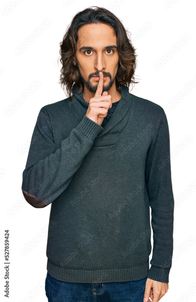 Young hispanic man wearing casual clothes asking to be quiet with finger on lips. silence and secret concept. Young hispanic man wearing casual clothes asking to be quiet with finger on lips. silence and secret concept.