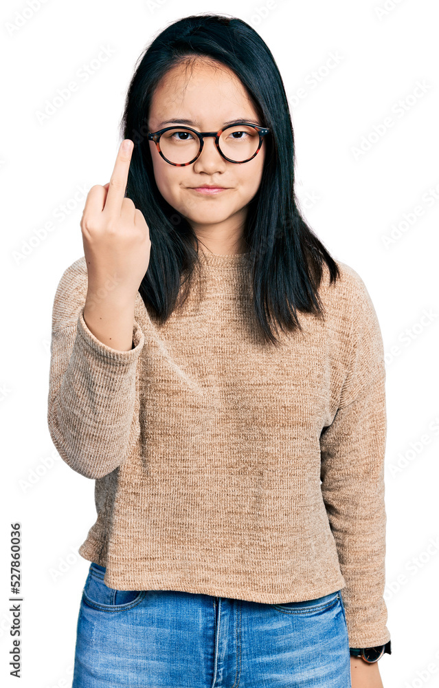 Young chinese woman wearing casual sweater and glasses showing middle finger, impolite and rude fuck off expression