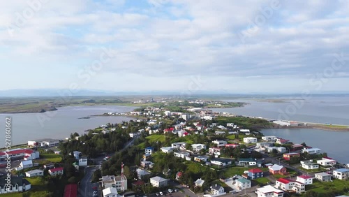 Town of Borgarnes with the Fjord and Mountains in the Vesturland, Iceland Drone Video  photo