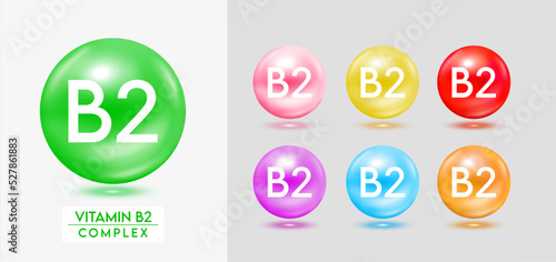Vitamin B2 complex. Set of colorful balls multivitamins capsules minerals isolated on grey background. Dietary supplement for pharmacy advertisement, package design. Vector EPS10.