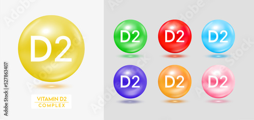 Vitamin D2 complex. Set of colorful balls multivitamins capsules minerals isolated on grey background. Dietary supplement for pharmacy advertisement, package design. Vector EPS10.