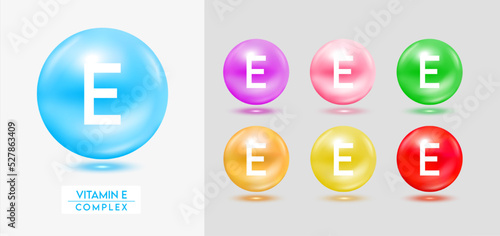 Vitamin E complex. Set of colorful balls multivitamins capsules minerals isolated on grey background. Dietary supplement for pharmacy advertisement, package design. Vector EPS10.